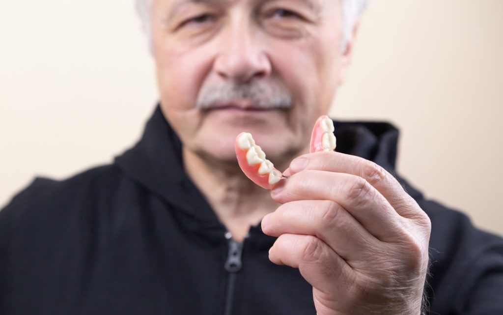Getting Used to Dentures: 4 Key Tips for an Effortless Transition