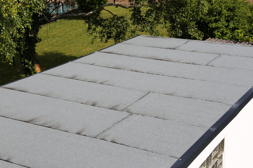 How to Tarp a Flat Roof