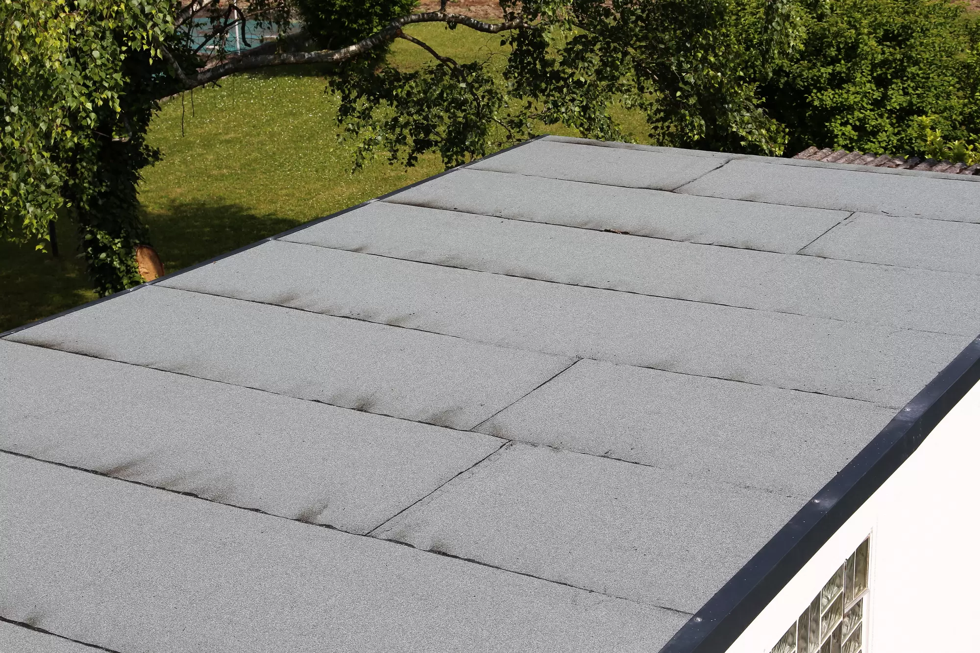How to Tarp a Flat Roof