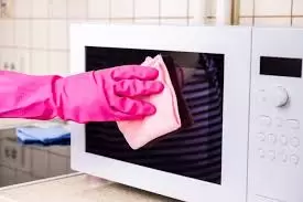 How To Clean a Microwave Oven